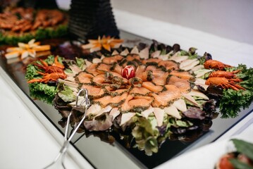 Counter-top displaying a variety of sliced meat