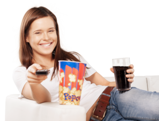 Smiling Woman Using Remote Control with Popcorn and a Drink