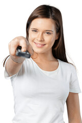 Woman holding remote controller and smiling on white © BillionPhotos.com