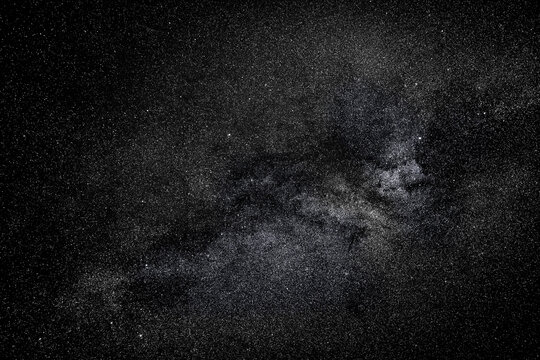 Night sky - North with plenty of sparkling stars illuminated in the galaxy. Starry constellation and universe in dark pitch black sky. A beautiful background, screensaver or wallpaper
