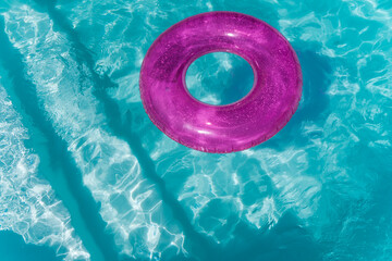 A pink float in a pool without people