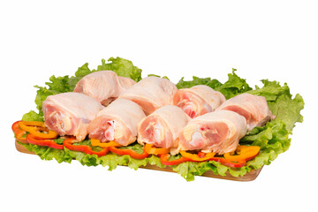 raw chicken meat on cutting board on white background