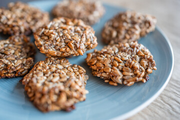 Vegan cookies made of banana and different seeds, photographed with natural light