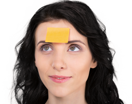 Young cute woman with yellow sticker on head isolated on white background
