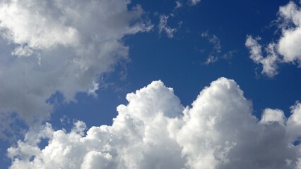 cumulus-like clouds as a background against the sky