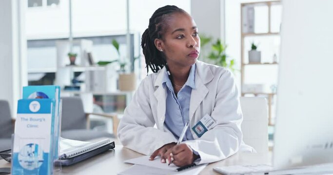 Black Woman, Doctor And Writing Paper By Computer For Report, Planning And Healthcare Compliance On Internet. Woman, Medic And Paperwork For Health Insurance, Agreement Or Admin In Hospital Office