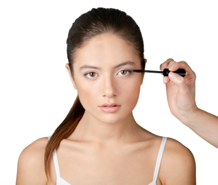 Woman applying mascara isolated on white background