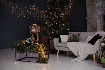 New Year's room interior decor, beautiful Christmas tree and fireplace in the background