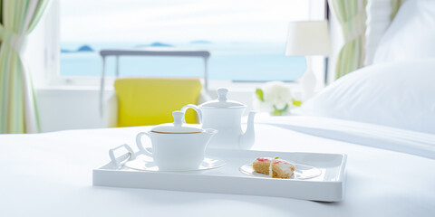 Luxury tourist resort breakfast in hotel room with stunning ocean view	