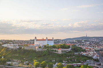 Beautiful view of the Bratislava castle on the banks of the Danube in the old town of Bratislava, Slovakia on a sunny summer day