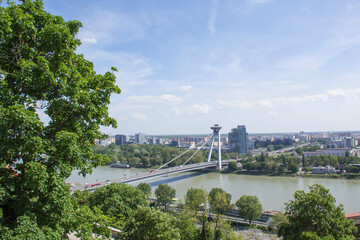 Beautiful view of The Bratislava UFO Tower on the banks of the Danube in the old town of Bratislava, Slovakia on a sunny summer day 