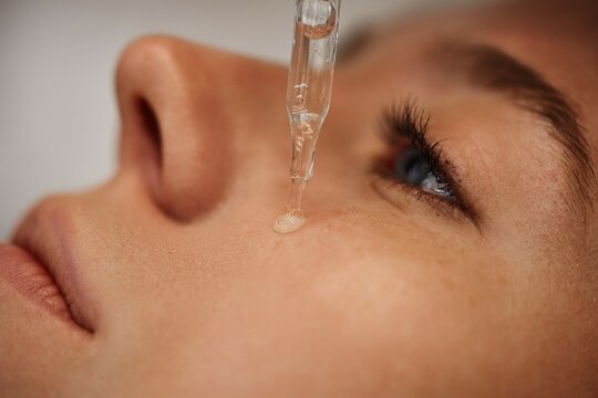Facial skincare using gadgets and serums for smoother, moisturized skin and reduced wrinkles.