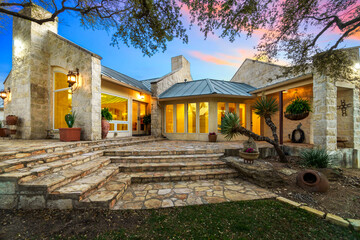 a luxury stone patio at sunset 