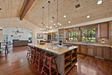 a farmhouse kitchen with wood floors and accents - obrazy, fototapety, plakaty