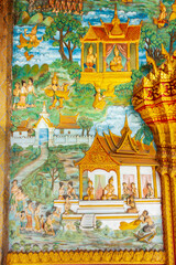 Luang Prabang, Laos. Ancient mural carvings in Wat Mahathat facade.