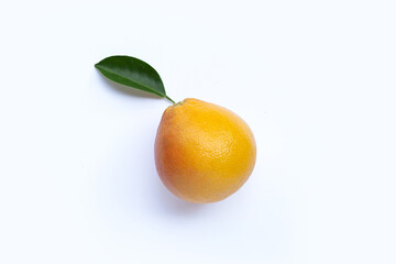 High vitamin C. Juicy grapefruit with leaves on white background. Copy space