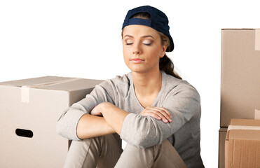 Young cute woman with boxes isolated on white background