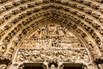 France, Paris. Front facade of Notre Dame. The Last Judgement in high relief.