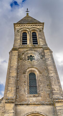 Fototapeta na wymiar Exterior steeple, Saint Laurent Church, Longues-sur-Mer, Normandy, France.