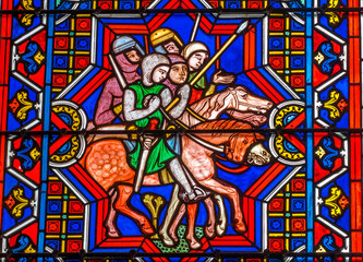 Obraz na płótnie Canvas Colorful knights horses stained glass, Bayeux Cathedral, Bayeux, Normandy, France. Catholic church consecrated in 1077