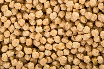 Dried chickpea seeds texture. Natural food background..