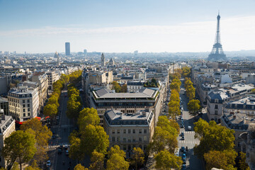 Fototapeta premium Picturesque panoramic view of Paris with Eiffel Tower from roof of Triumphal Arch, France