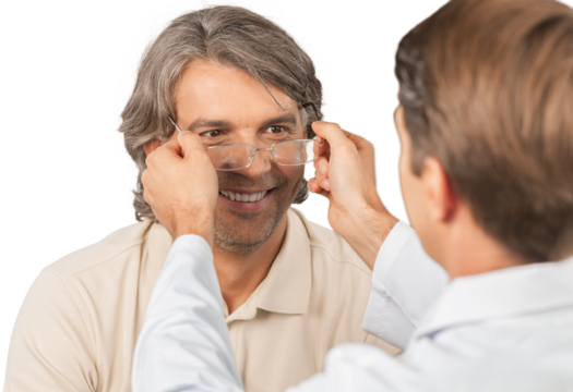 Young  man trying his new pair of glasses after the eye exam