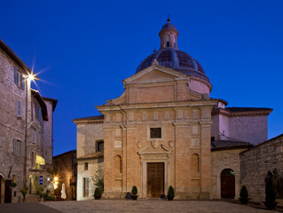 Fototapeta na wymiar Italy, Umbria, Assisi. Evening light on the Convento Chiesa Nuova.