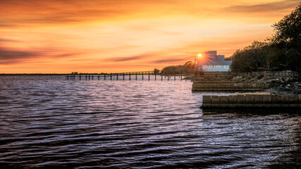 A stunning sunset over the bay near Destin, Florida with beautiful blue water