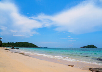 Landscape summer front view  tropical sea beach rock blue white sand background calm Nature ocean Beautiful wave crash splashing water travel Nang Ram Beach East thailand Chonburi Exotic horizon.