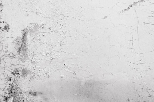 Abstract for background. cracked concrete vintage wall background. The walls of the wall paint peel off because of the long age and moisture on the wall, Surface of a textured wall with.