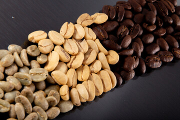 Roasted coffee beans background  colombian coffe rought coffee
