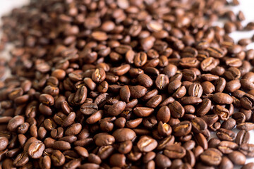 Roasted coffee beans background  colombian coffe rought coffee