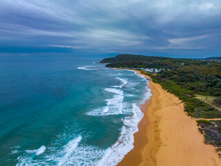 Aerial sunrise at the seaside with cloud cover