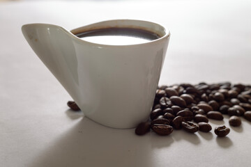 cup of coffee with beans, colombian coffee