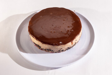 chocolate cake on a plate , chocolate mousse , dessert of tiramisu