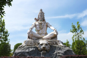 Fototapeta premium God Shiva meditates sitting on a tiger skin in Rishikesh, India.