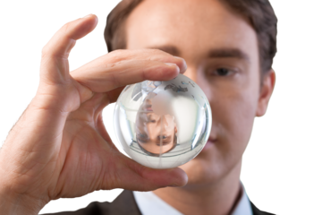 Businessman holding glass globe isolated on white background