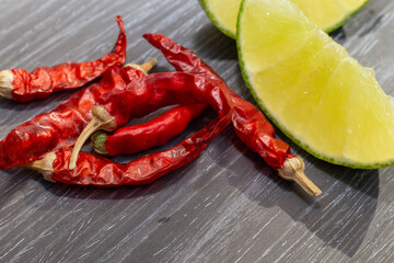 red hot chili pepper , spicy jalapeno , dry chili and lemon