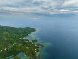 Aerial view of coastline of the island with jungle and beaches. Negros, Philippines