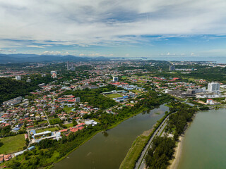 Aerial drone of panorama of Kota Kinabalu city with modern buildings. Borneo,Sabah, Malaysia.
