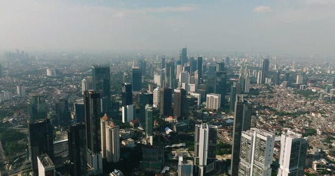 Aerial drone of business center of Jakarta with skyscrapers. Indonesia.