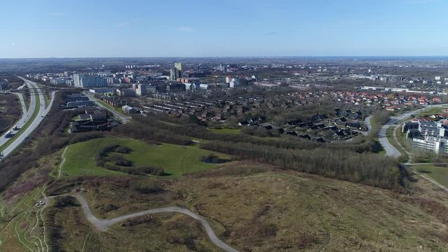 Aerial push in from e22 highway toward ideon, with lund and &ouml;resund in background. Sweden Sk&aring;ne
