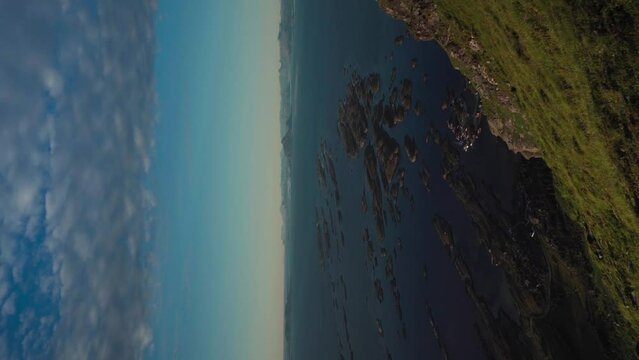 Vertical Shot Of Blue Sky And Fjord Around The Lovund Island In Norway. - wide