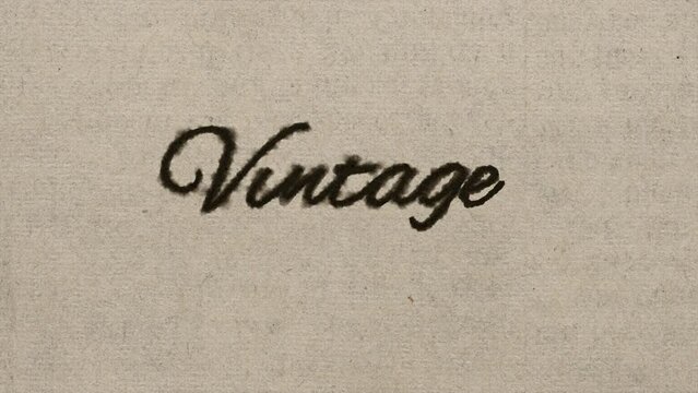 Script font graphic with ink bleeding into paper and on green screen, writing the text "vintage", in 4k at 60fps.