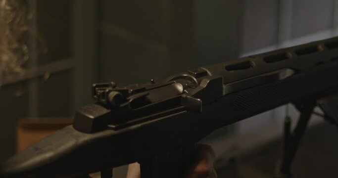 Close up of Ruger Mini-14 semi-automatic rifle firing a shot
