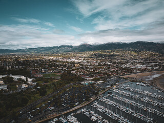 Santa Barbara Harbor in Winter with Snowcapped Mountains