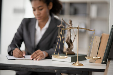 Lawyers Asiawoman   having through online Concepts  of Legal services at the law office.