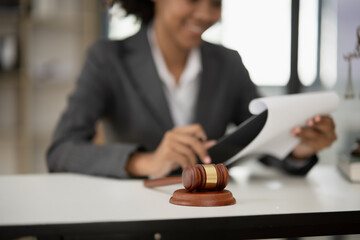 Lawyers Asiawoman   having through online Concepts  of Legal services at the law office.