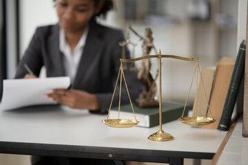 Lawyers Asiawoman   having through online Concepts  of Legal services at the law office.